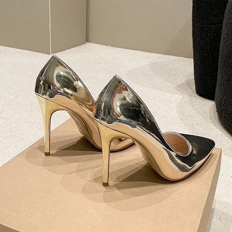 Gold pointed toe stiletto heel pump with low-cut PU leather upper