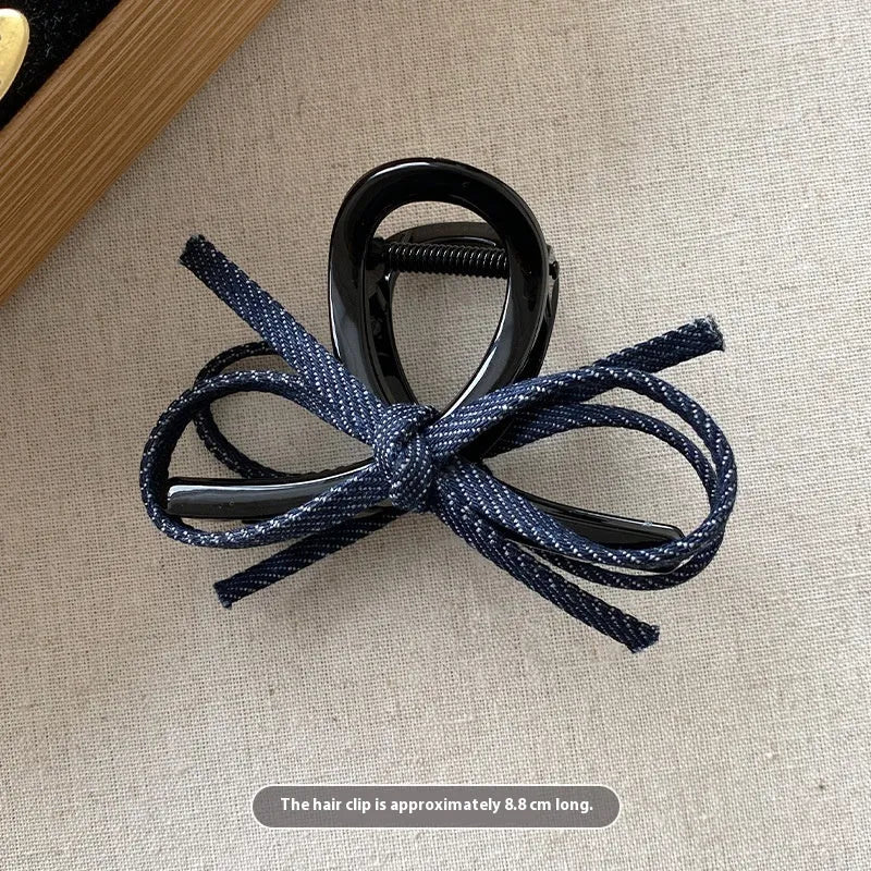 Blue denim bow barrette with cloth bow and metal clip on women back head hair