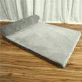 Grey corduroy pet sofa bed for a large dog, showing a non-slip cloth base and plush high-density sponge padding.