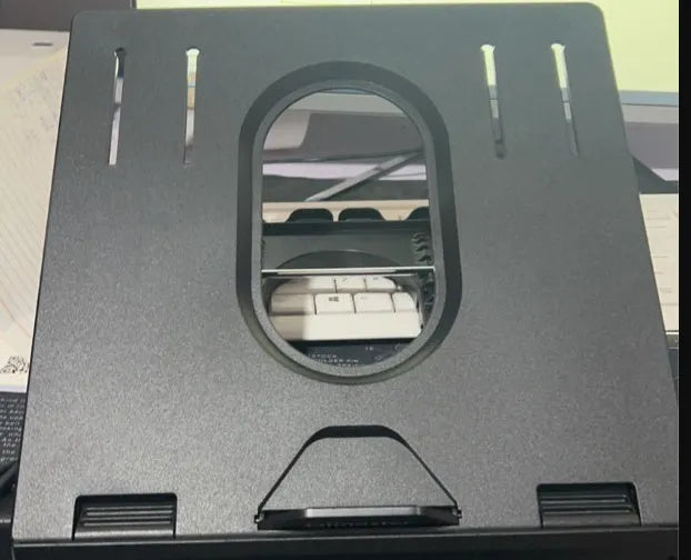 Folding laptop stand with 9 adjustable heights, anti-slip panel and phone holders, in black or white.