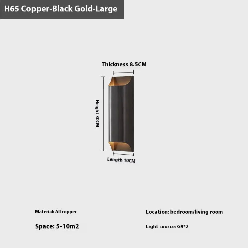 Minimalist copper wall lamp with black gold finish mounted beside bed