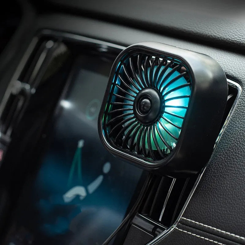 Small black USB car fan with three-speed keyboard controls on compact base