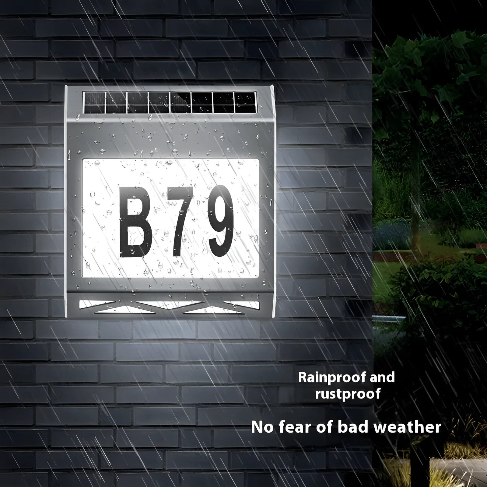 Solar powered waterproof doorplate light with LED illumination in black or silver finish