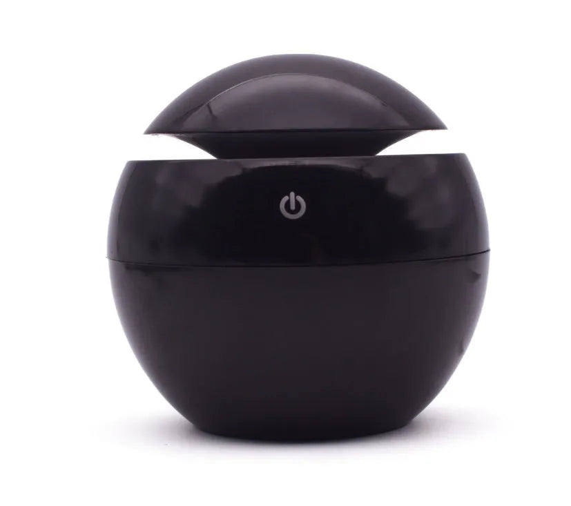 White USB ultrasonic atomiser humidifier with 130ml water tank measuring 110x110x95mm