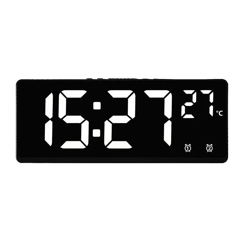 Large screen electronic LED alarm clock showing time and temperature, in a black acrylic casing.