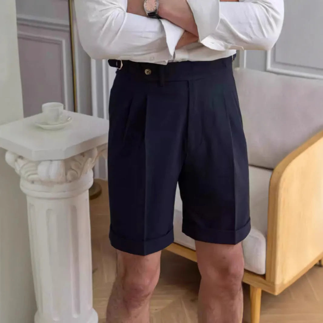 Men's straight-leg kilge shorts in apricot colour on a white background.