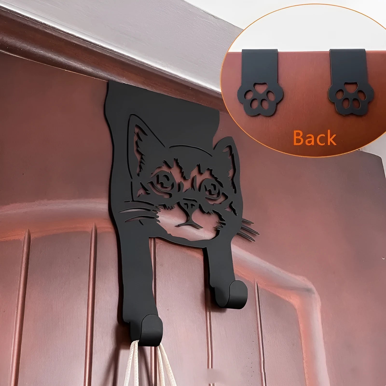 Black iron cat-shaped decorative wall hook for doors and rooms.