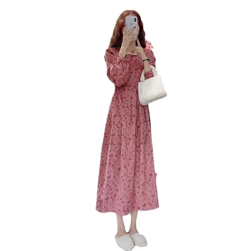 Red knitted cotton midi dress with floral pattern and 3/4 princess sleeves on a mannequin.