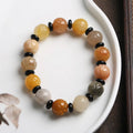 Hetian natural jinsi jade bracelet with geometric lotus pumpkin beads in 10mm or 12mm sizes.