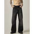 Black American retro loose straight jeans with zip fly opening on denim background