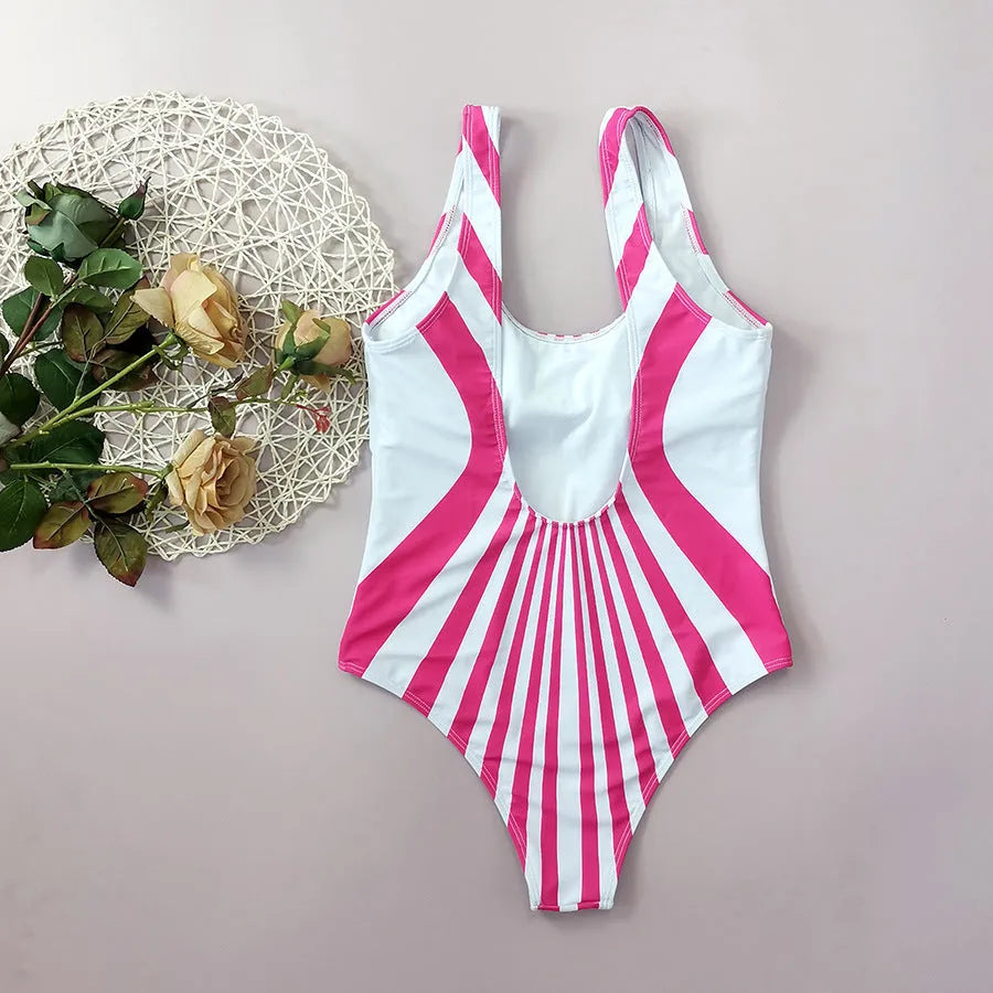 Pink striped women's one-piece swimsuit with all-over digital print on front and back.