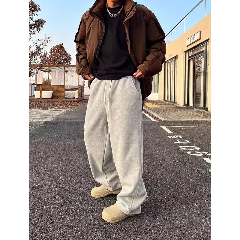 Men's casual sweatpants in black cotton loose fit with elastic waist and mid rise side view
