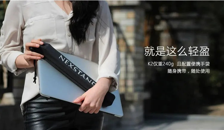 Black K2 portable foldable laptop stand made of enhanced nylon with carry bag.