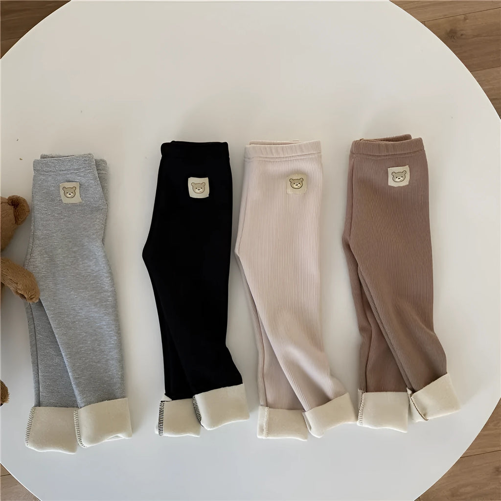 Girls' high-waist fleece-lined winter leggings in beige, black, brown, and grey with a hair band belt.