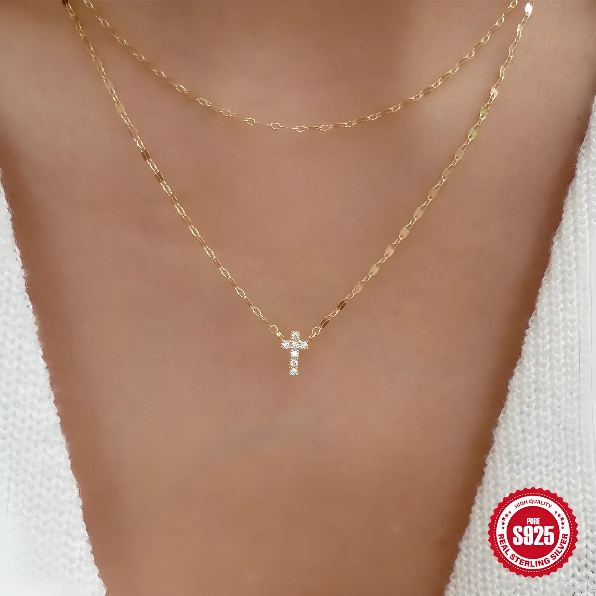 S925 sterling silver double layer twin diamond cross pendant on a gold plated clavicle chain.
