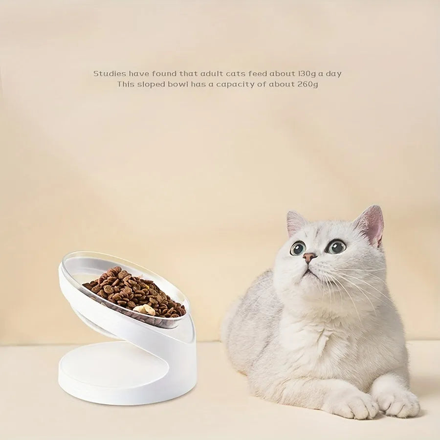 White elevated clear plastic cat food bowl with a tilted feeding surface for neck support.