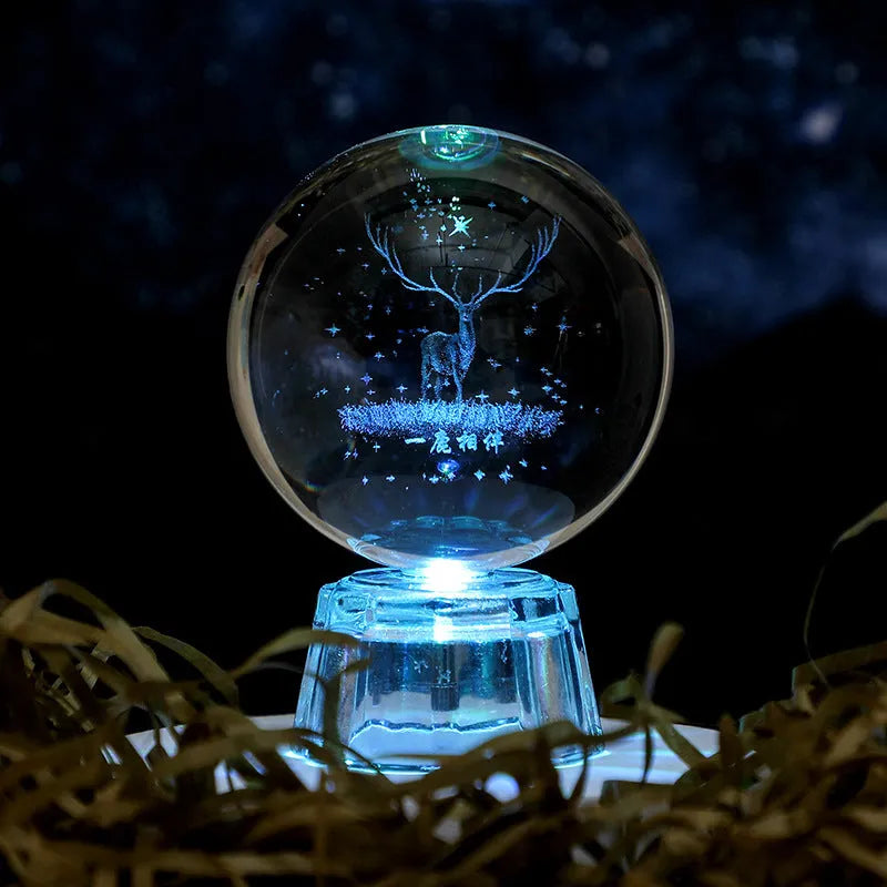 Transparent 6cm crystal ball ornament with inner carving on a fixed base, modern minimalist decor.