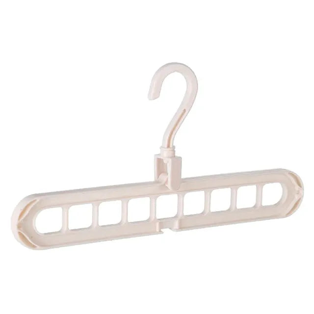 Plastic clothes hanger with rotating hook in pink colour, shown next to a green hanger.