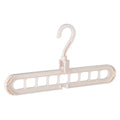 Plastic clothes hanger with rotating hook in pink colour, shown next to a green hanger.