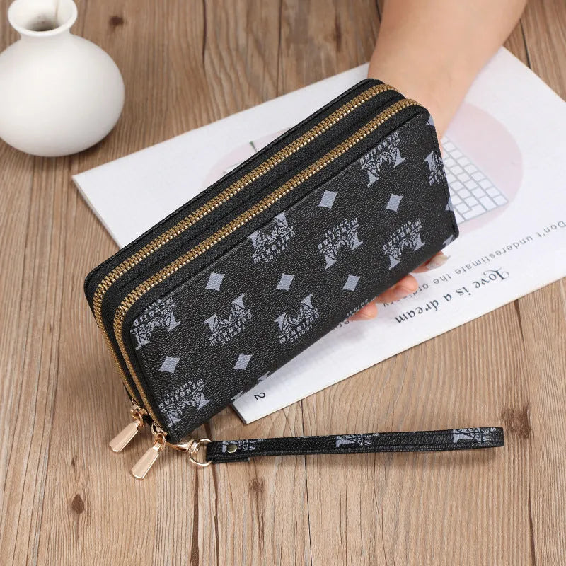 Retro-style long PU leather wallet clutch with printed design showing mobile phone compartment and zipper closure