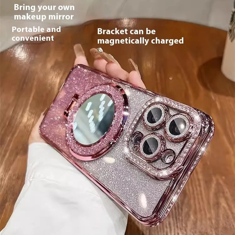 Gradient glitter phone case for iPhone with a built-in flip-out makeup mirror on a stand.