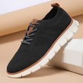 Men's grey and black mesh fabric casual sneakers with low heel and round toe.