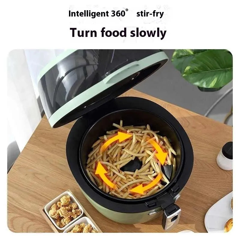 Silver mechanical button air fryer with transparent lid showing 8-litre nano-ceramic cooking basket inside.