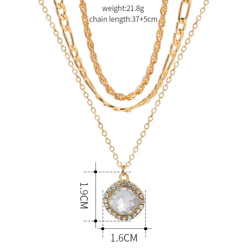 Gold multi-layer pendant necklace with large hemp flowers chain and round geometric pendants on alloy base
