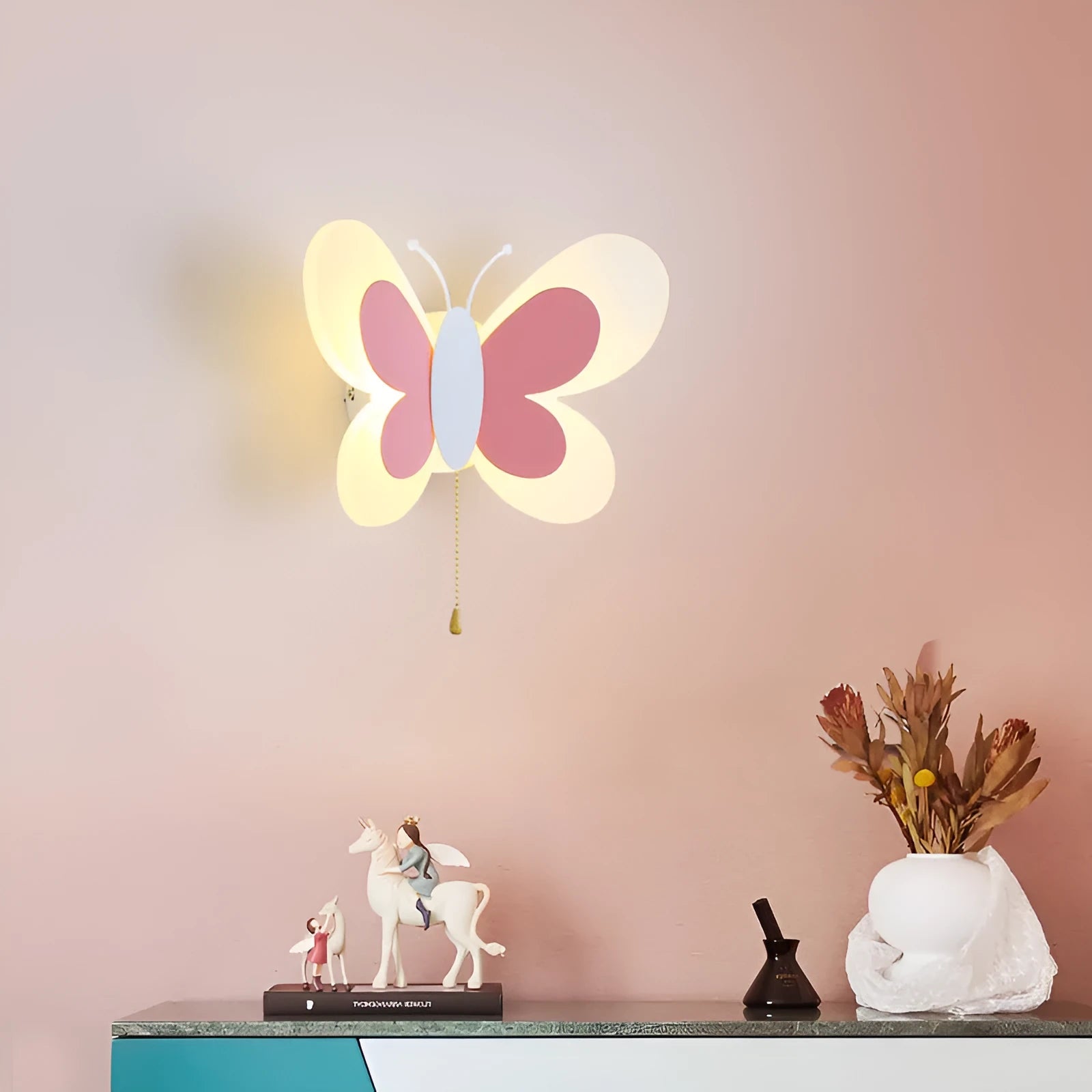 Butterfly-shaped acrylic children's wall lamp in pink and white, 240x170x105mm, with tri colour dimming option
