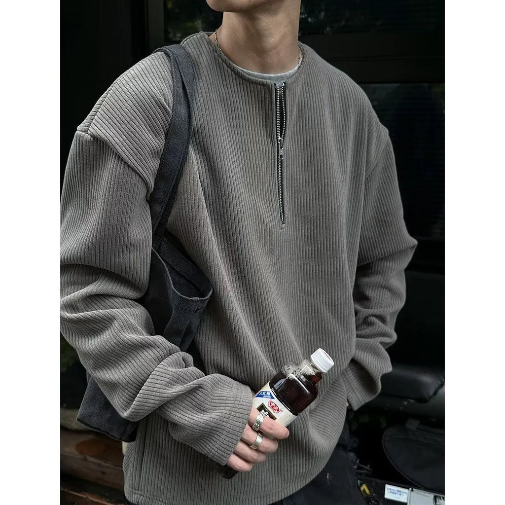 Men's solid grey loose-fit long sleeve pullover top on a hanger.