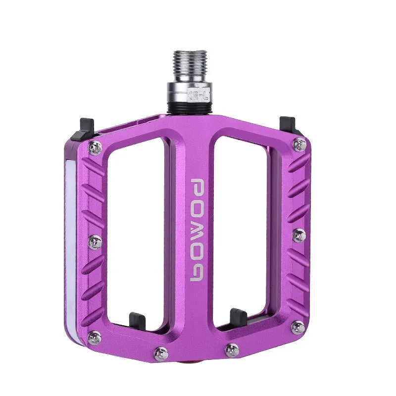 Pair of aluminium alloy bicycle pedals with integrated 710 LED lights in a choice of colours.