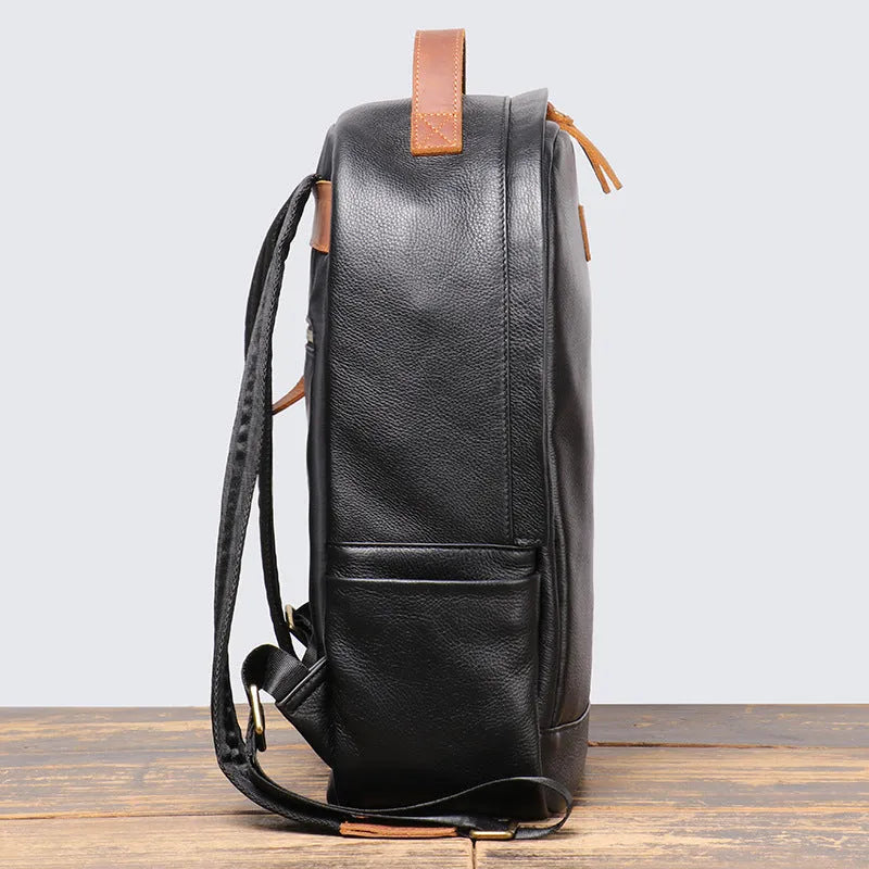 Black genuine leather top grain cowhide expandable travel backpack with curved shoulder strap