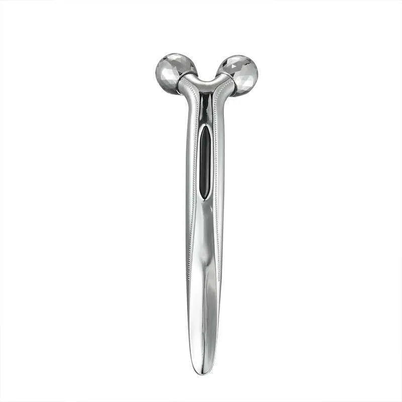 3D face-lifting manual roller massager with positive ion function in silver UV-plated finish