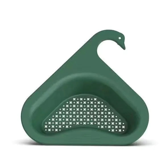 Blue plastic swan-shaped basket hanging over a kitchen sink edge to drain fruit and vegetables.