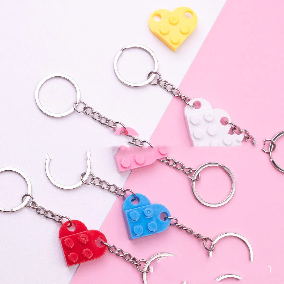 Heart-shaped plastic key chain with split blocks in multiple colours, 5x3x3.5cm