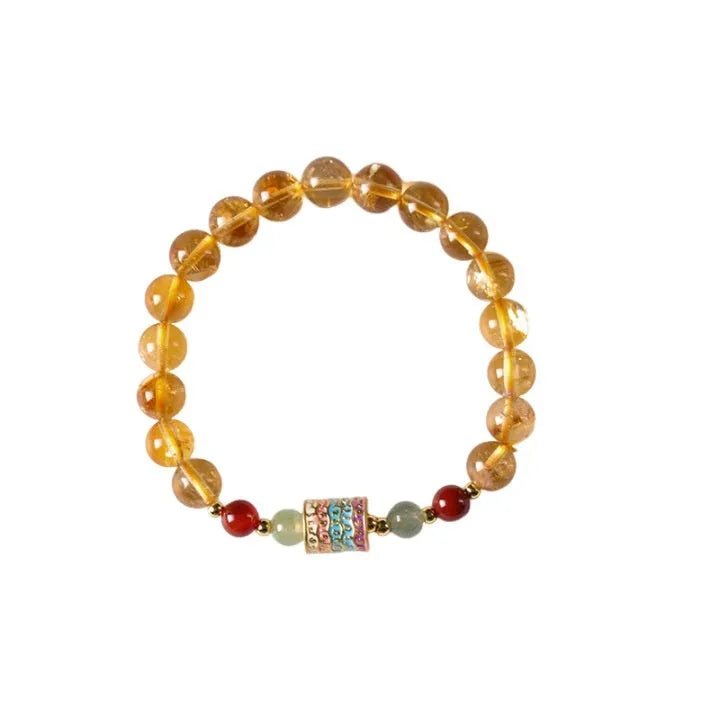 Yellow citrine bracelet with colourful prayer wheel beads on an 8mm round bead strand.