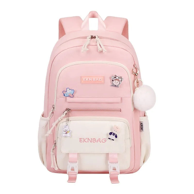 Girls waterproof school backpack in pink colour with curved shoulder straps and spine protection features