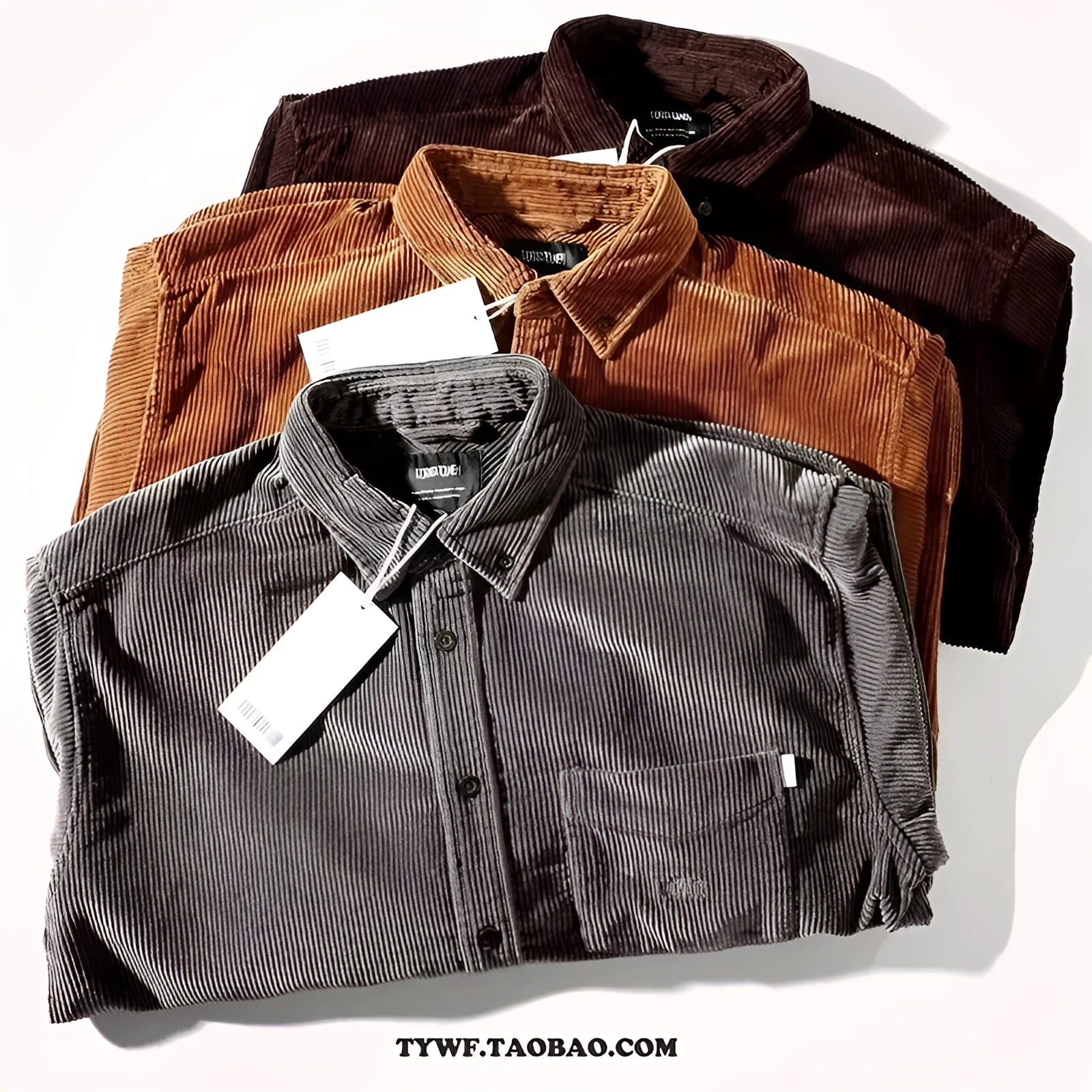Loose fit caramel corduroy long sleeve shirt with a cardigan style on a hanger.