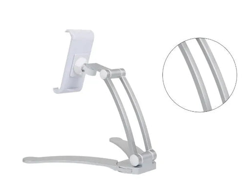 Silver aluminium alloy tablet stand with adjustable black clips holding a tablet, showing 360-degree rotation on a wooden desk.