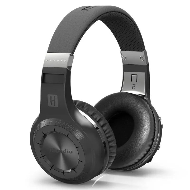 Wireless Bluetooth subwoofer headphones with 57mm driver in white, featuring PU earplugs and 1.2m cable