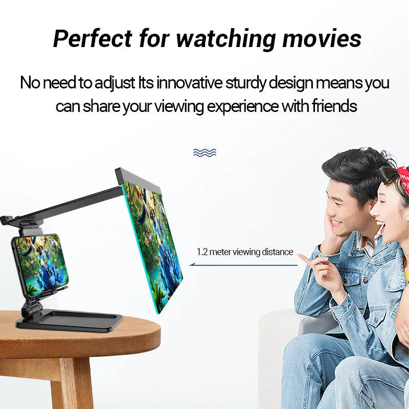 Black foldable mobile phone screen magnifier with detachable shading holder on a desktop.