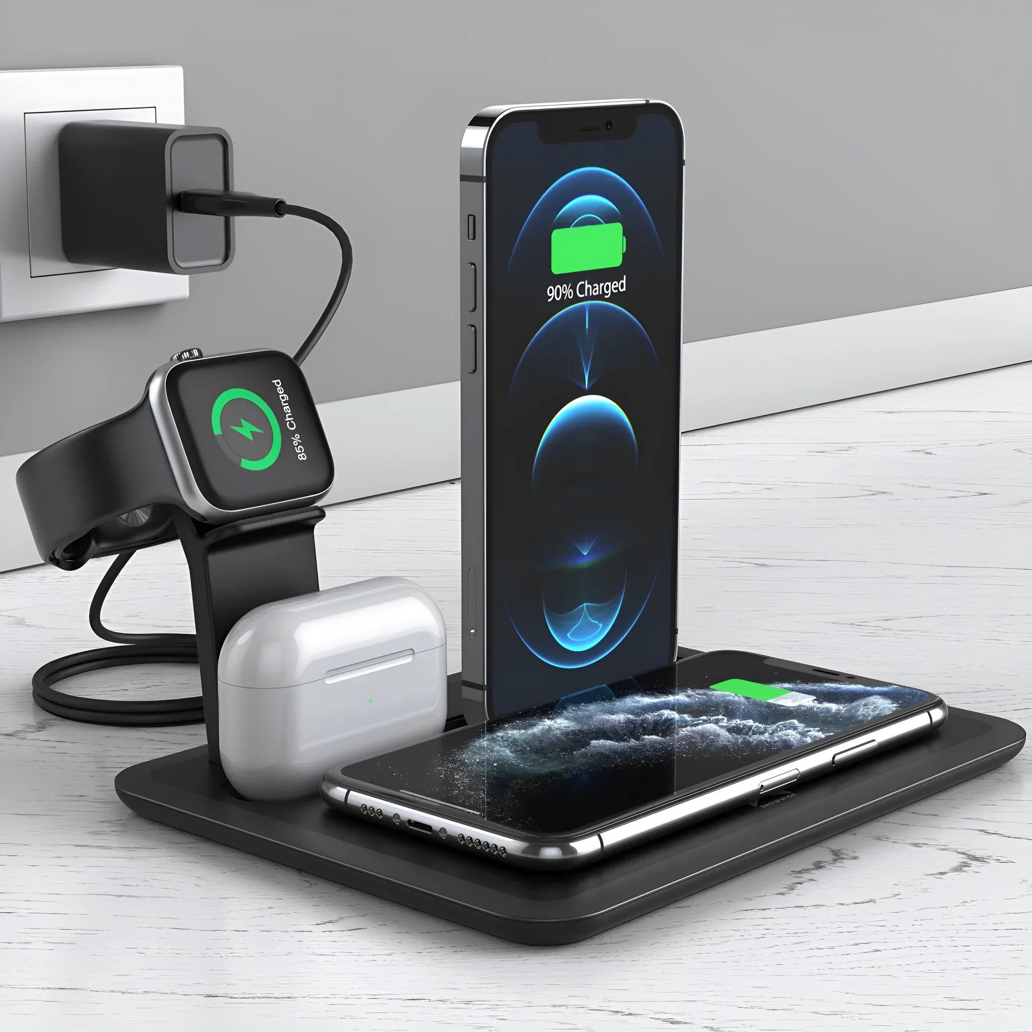 Black and white desktop wireless charging station holding a phone, watch, and headphones with a USB cable.