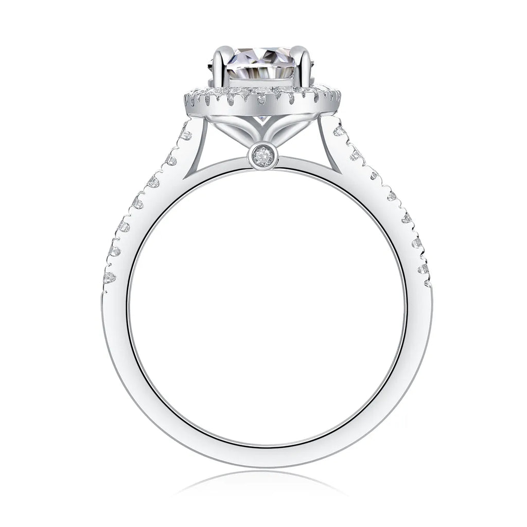 Audrey moissanite wedding ring set with egg-shaped 7x9mm stone in S925 silver platinum plating on white background