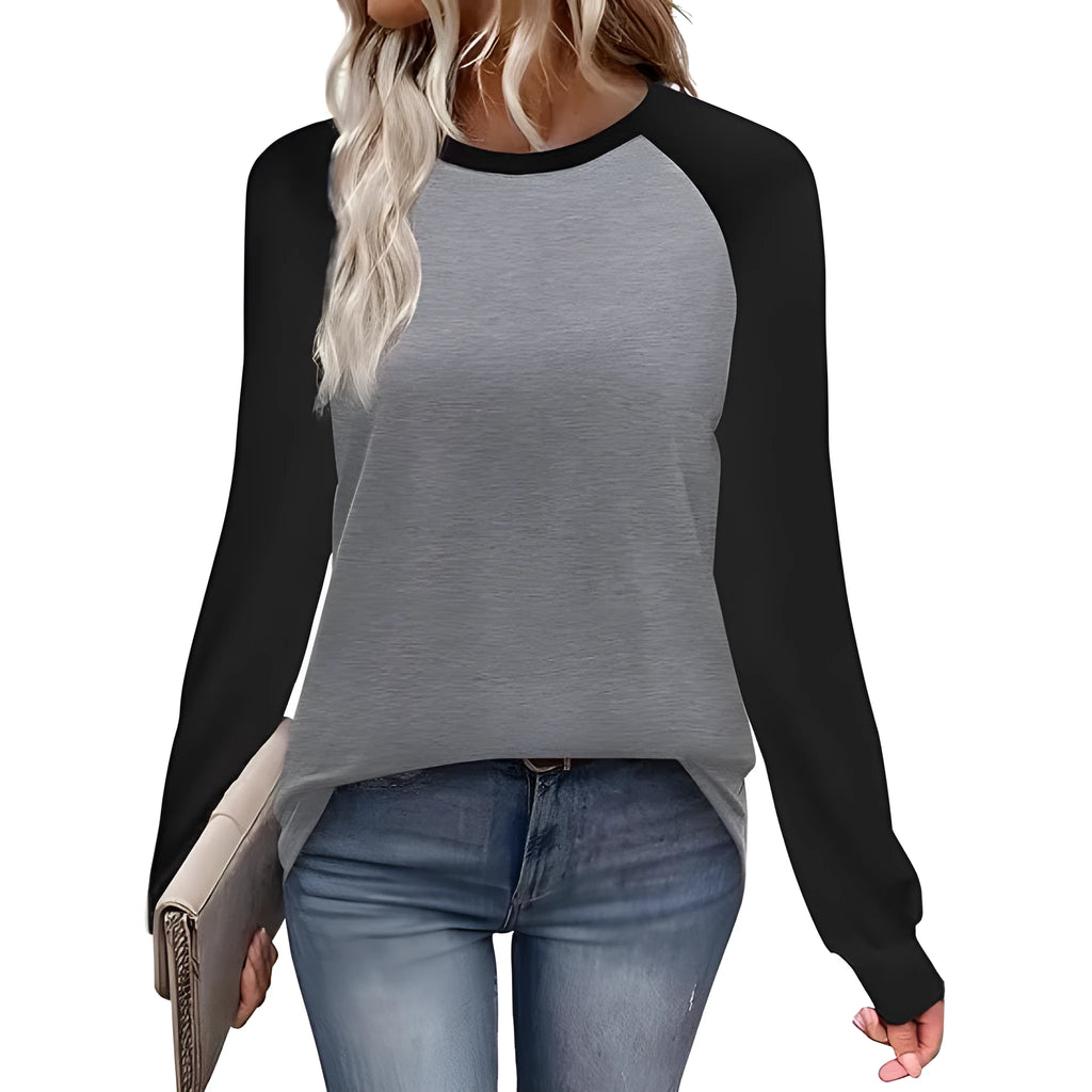 Long sleeve solid colour T-shirt in black, blue, grey, or pink on a hanger