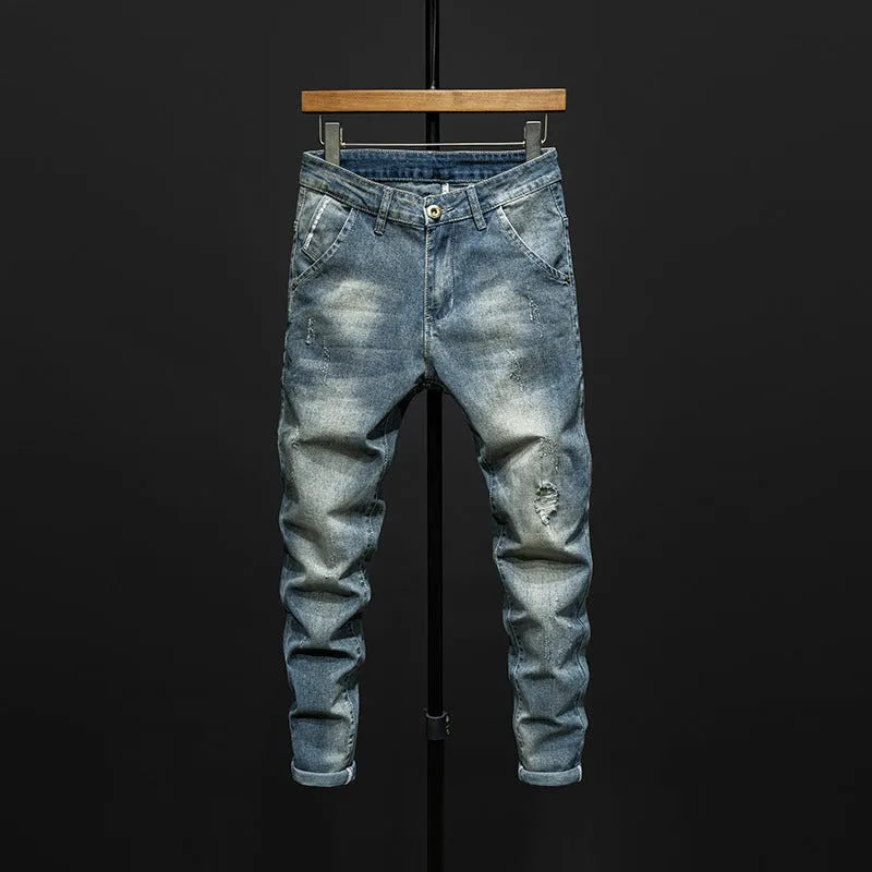 Men's dark blue and light blue slim-fitting skinny jeans made from cotton denim.