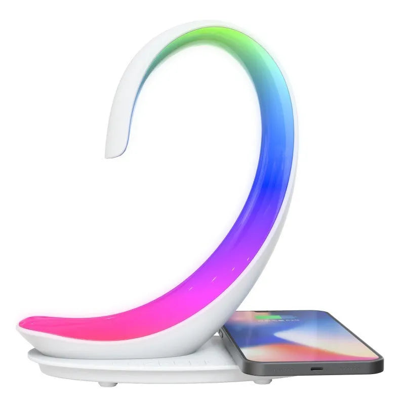 White swan-shaped desk lamp with colourful LEDs, integrated wireless charger, and Bluetooth speaker.