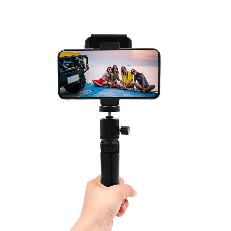 Silver aluminium bracket clip for mounting an iPhone onto a table top tripod.
