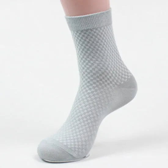 Men's bamboo fibre socks with a small square pattern in five colour options.