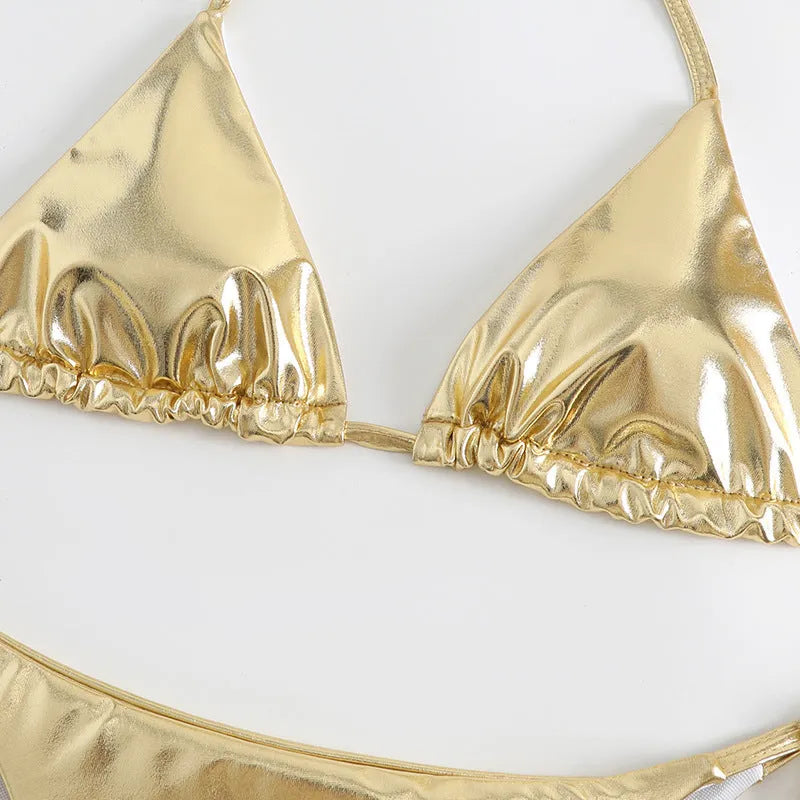 Women's lace-up bikini in metallic colour with adjustable ties and polyester fabric.