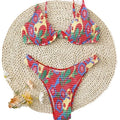 Red floral print women's underwire two-piece bikini swimsuit on a mannequin.